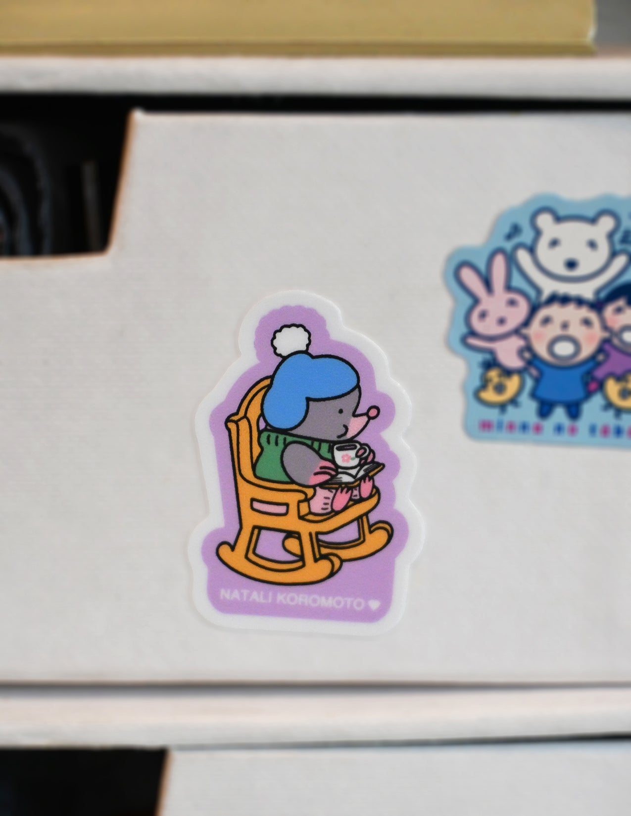 Pack of 10 vinyl stickers, Sticky Friends Edition #4. Designs by Natali Koromoto.
Includes one 4" x 6" postcard. 