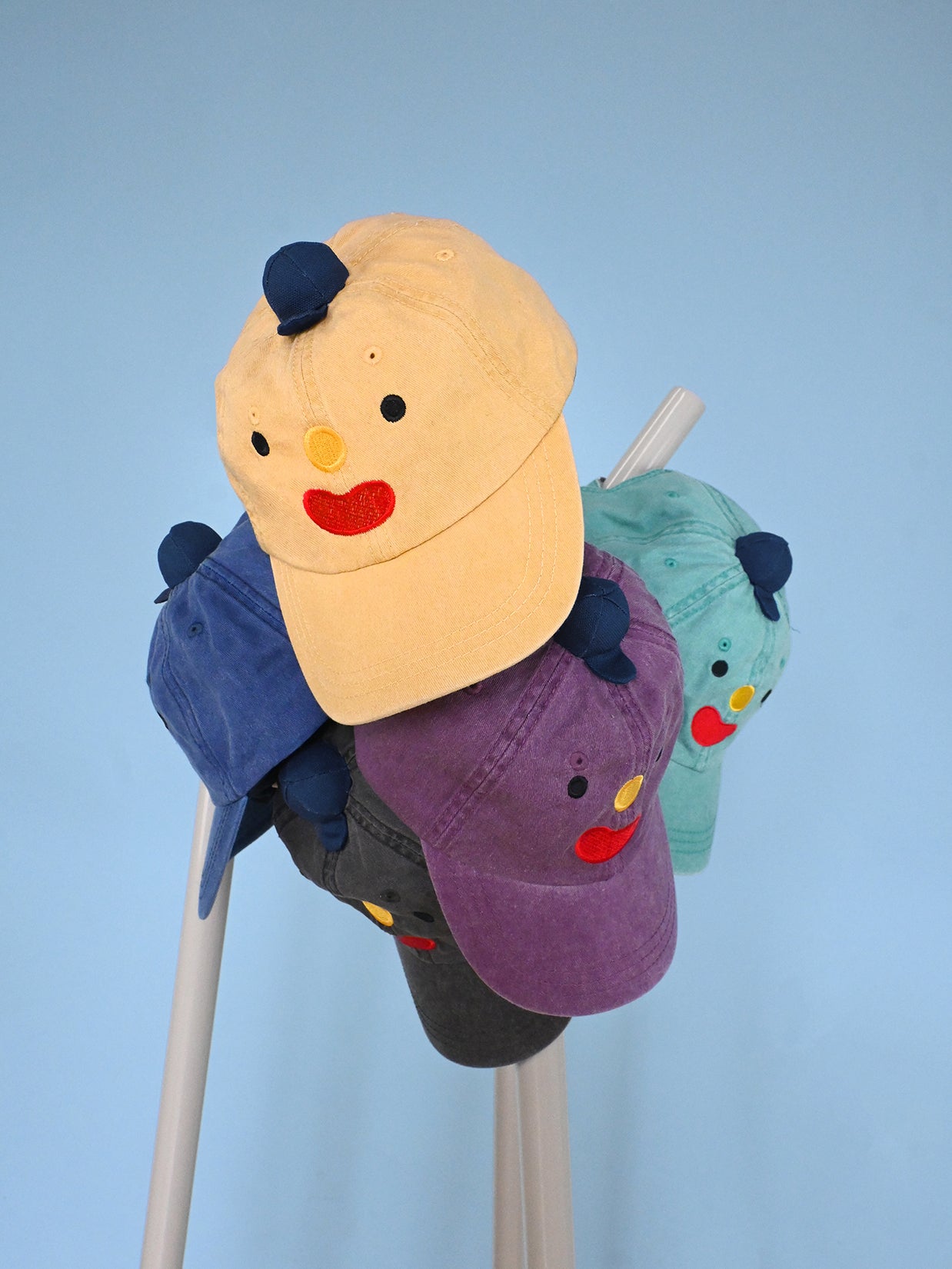 Home of the original "Hat on Hat". Design by Natali Koromoto Martinez 