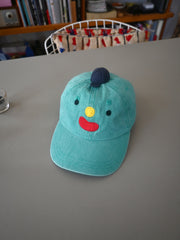 Home of the original "Hat on Hat". Design by Natali Koromoto Martinez 