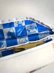 Blue and white patterned pouch with visible brand logo on a light gray background