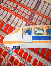 "The Passengers" throw pillow by Natali Koromoto. Showing full side view with animal characters enjoying their adventure on the Shinkansen bullet train.