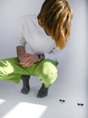 Natali Koromoto x HO HOS HOLE IN THE WALL brands "Ants on Your Pants"  print design lounge pull-on pants in Avocado green dye colorway. 100% organic cotton twill.